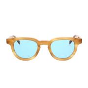 Stilfulde solbriller med ravfarvet stel og blå linser