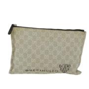 Pre-owned Canvas clutches