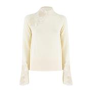 Blomstret Blonde Turtleneck Sweater