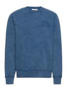 Hugh Embossed Sweatshirt Designers Sweatshirts & Hoodies Sweatshirts Blue Wood Wood