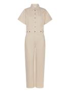 Denim Jumpsuit With Multi-Position Buttons Bottoms Jumpsuits Beige Mango