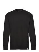 Woven Tab Waffle Ls Tops T-Langærmet Skjorte Black Calvin Klein Jeans