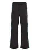 T7 Play.paris. Track Pants Sport Women Sport Clothing Sport Pants Sport Sweatpants Black PUMA